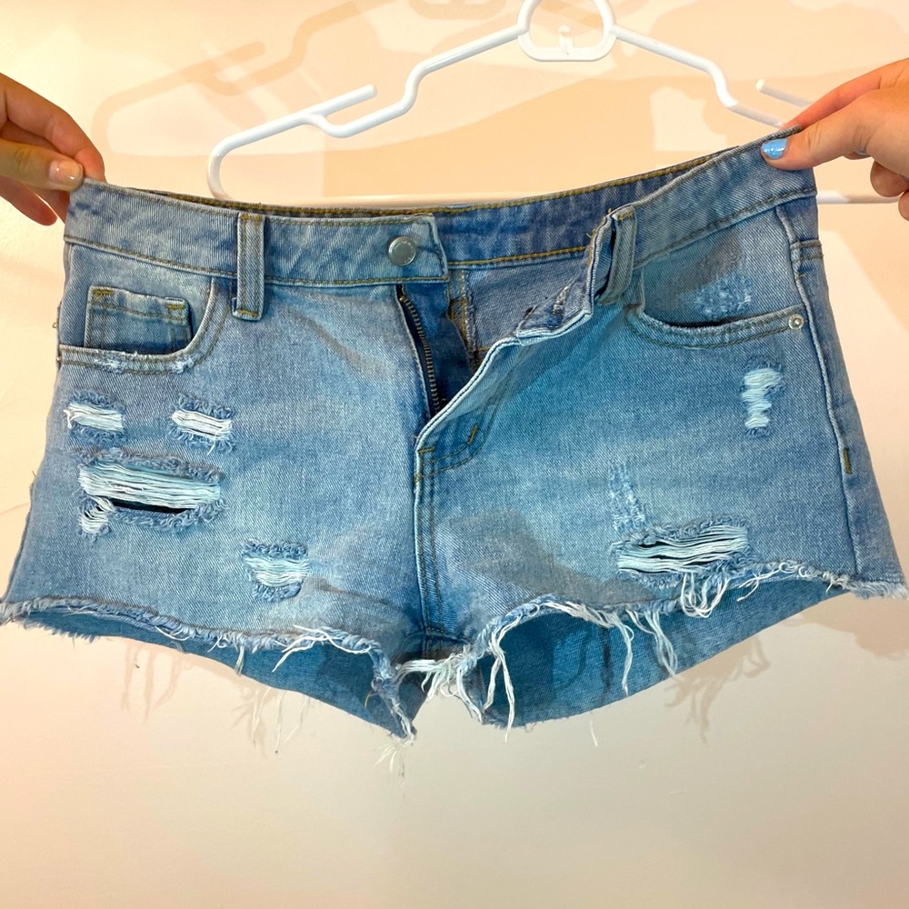 Light wash ripped jean shorts